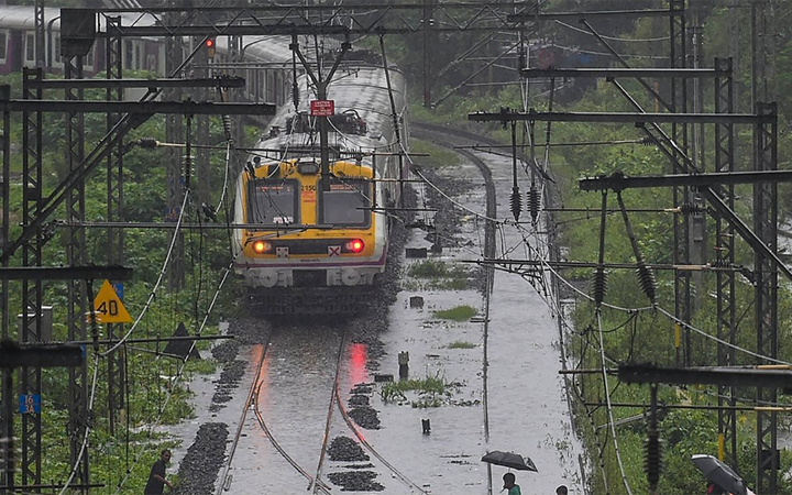 Mumbai Train Services Disrupted as Heavy Rains